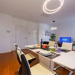 Of - Happy لوغانو